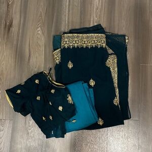 Deep turquoise and gold traditional sari